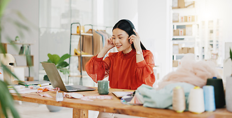 Image showing Business woman, laptop and headphones for music while working at office desk, agency or company. Happy worker listening to radio, audio or sound on computer, internet and online podcast on technology