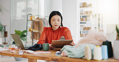 Image showing Fashion designer woman planning her small business startup with checklist in textile, tailor and fabric check at office studio. Quality control, manufacturing and asian person coffee for productivity