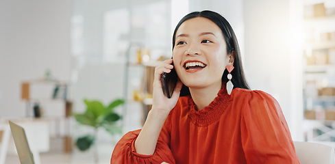 Image showing Phone call, laptop and order with a designer asian woman at work in her fashion office for creative style. Contact, ecommerce and design with a female employee talking on her phone for retail