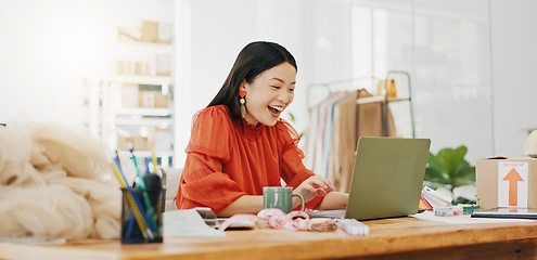 Image showing Fashion designer or woman winning on laptop for small business, startup success and online shop goals celebration. Ecommerce seller, asian person or winner yes, celebrate her clothes sales or profit