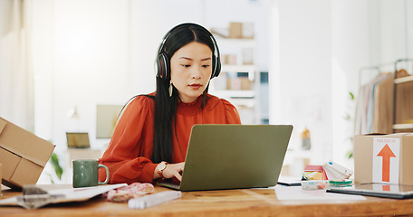 Image showing Business, fashion designer and Asian woman with checklist for planning, logistics and order delivery. Retail, commerce and girl listen to music for productivity for clothes, shipping and distribution