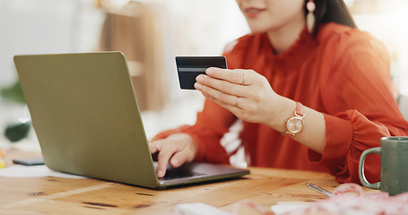 Image showing Woman hands, credit card and laptop for business online shopping, trading or fintech payment in office startup. Professional person typing bank information on computer for website loan or transaction