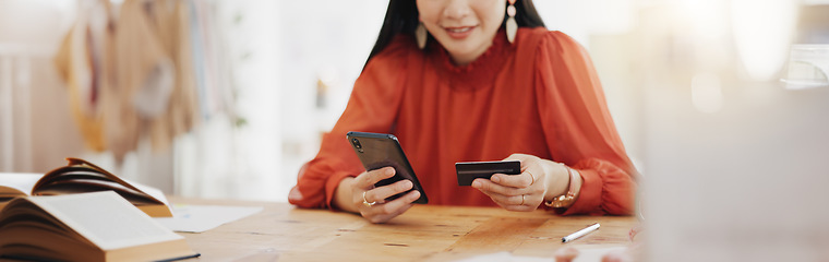 Image showing Woman hands, credit card and phone for business online shopping, trading or fintech payment in office startup. Professional person typing bank information on cellphone for website loan or transaction