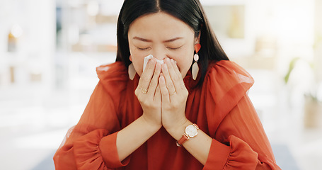 Image showing Tissue, blowing nose and sick Asian woman in office with sinus infection, virus and allergy symptoms. Business, corporate workplace and female worker at desk with cold, fever problem and flu sickness