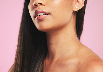 Image showing Beauty, mouth and woman face closeup with skincare, lip filler and hair care in a studio. Cosmetics, pink background and female model with facial, lips and skin glow from dermatology and treatment