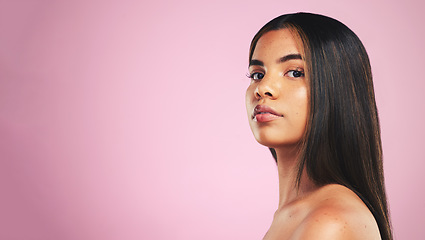 Image showing Portrait, hair care and woman with growth, wellness and dermatology on a pink studio background. Face, person or model with skincare, cosmetics or luxury with self care, mockup space or spa treatment