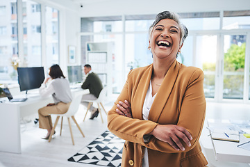 Image showing Happy, mature woman and manager with arms crossed in office, workplace and confident in working for professional startup. Portrait, smile and person with pride and happiness in Egypt business