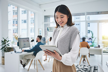 Image showing Business woman, tablet and office workspace for digital marketing, planning workflow and online management. Professional employee, worker or designer typing or scroll on technology for social media