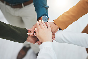 Image showing Stack, team building or hands of business people for goal, mission or collaboration with support. Partnership, closeup or top of colleagues in meeting huddle for vision plan, motivation or solidarity