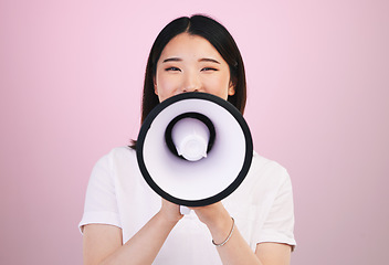 Image showing Megaphone announcement, portrait and Asian woman with retail sales discount, promotion deal or broadcast news. Speech, studio or Japanese speaker noise, attention and voice opinion on pink background