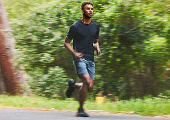 Image showing Man running with speed in park for exercise, fitness and power of cardio workout, action and race. Runner, sports athlete and motion blur for marathon training, energy and fast performance outdoor