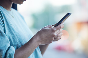 Image showing Online, typing and hands of person with phone for social media, browse website and text message. Blurred background, networking and closeup of woman on smartphone for internet, research and email