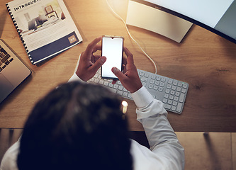 Image showing Business person, hands and phone screen for social media, reading chat and communication or marketing at office desk above. Worker or editor typing on mobile app with mockup space for ux or ui design