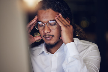 Image showing Business man, stress and headache on computer for stock market crash, bankruptcy and night mistake or error. Professional worker or trader pain, depression or frustrated for trading fail on desktop