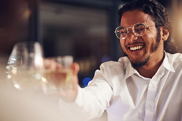 Image showing Celebration, happy man and friends toast alcohol for achievement, congratulations party and celebrate New year event. Night group cheers with champagne, wine or drinks glass at fine dining restaurant