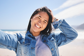 Image showing Portrait, smile and selfie of woman at beach on holiday, vacation and travel. Face, happy and Asian person at ocean in profile picture, social media and influencer on trip at sea on mockup space.