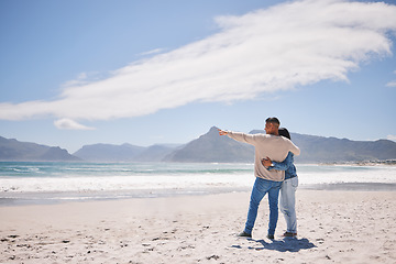 Image showing Love, hug and space with couple at beach for travel, summer vacation and romance together. Happy, relax and holiday with man and woman walking on seaside holiday for care, date and honeymoon mockup