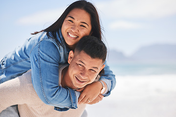 Image showing Summer, piggyback and portrait of a couple at the beach for a date, love or vacation together. Mockup, smile and a man and woman with a hug at the sea for a holiday, travel or bonding in marriage