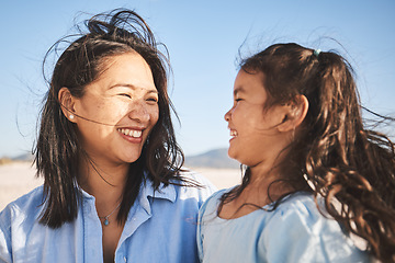 Image showing Smile, love and a mother and child at the beach for family, travel or summer freedom. Happy, Bali and a mom with a girl kid at the ocean for a holiday, bonding or together with care at the sea