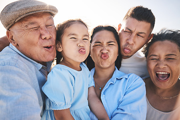 Image showing Funny, selfie and child with grandparents and parents in nature on a vacation, adventure or holiday. Comic, goofy and family generations taking a picture with silly faces by a sky on a weekend trip.