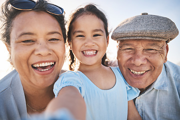 Image showing Smile, selfie and portrait of girl with grandparents in nature on fun family vacation or adventure. Happy, memory and child bonding and taking a picture with her grandmother and grandfather on a trip