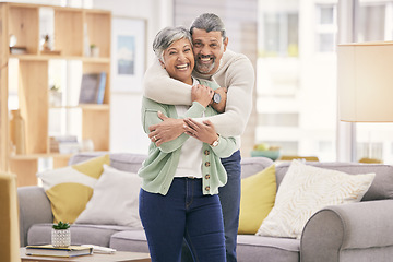 Image showing Portrait, hug and senior couple with a smile, home and love with marriage, bonding and retirement. Lounge, old man and mature woman embrace, affection and loving together with relationship and peace