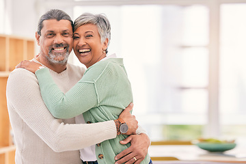 Image showing Happy senior couple, portrait and hug with love in living room bonding, romance or embrace together at home. Mature man or woman smile in happiness for loving relationship, affection or quality time