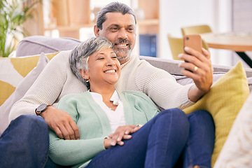 Image showing Selfie, happy and mature couple on couch with smile for social media post, profile picture and memories. Marriage, love and man and woman take photo in living room for bonding, relationship and relax