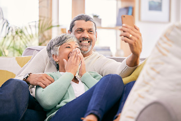 Image showing Happy, selfie and a senior couple with a phone on the sofa for communication, social media or a video call. Smile, house and an elderly man and woman taking a photo with a mobile on the couch