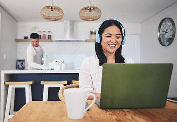 Image showing Remote work from home, smile and woman with a laptop, connection and typing with website information. Person, employee or freelancer with a pc, house and happiness with headphones, project or network