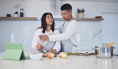 Image showing Tablet, cooking and couple in a kitchen, recipe and bonding with love, marriage and conversation. Home, man and woman with technology, online reading and nutrition with instructions and prepare lunch