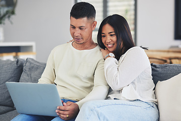 Image showing Relax, laptop and couple on a sofa in the living room doing online shopping together at home. Happy, love and young man and woman browsing on social media or the internet with computer at their house