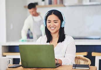 Image showing Remote work from home, headphones and woman with a laptop, copywriting and typing with research. Person, employee or copywriter with pc, kitchen and business owner with headset, project or connection