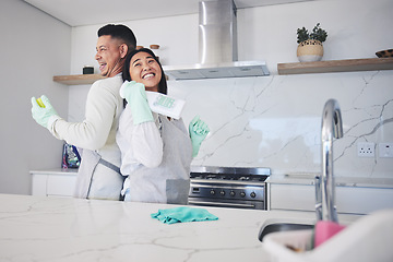 Image showing Happy, love and couple cleaning in kitchen for hygiene, safety and prevention of bacteria at home. Spring clean, bond and man with woman smile for household, housework or fun while sharing chores