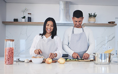 Image showing Happy, cooking and love with couple in kitchen for food, health and lunch recipe. Smile, nutrition and dinner with man and woman cutting vegetables at home for diet, wellness and romance together