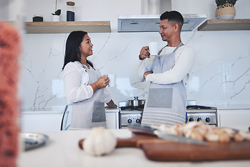 Image showing Couple in kitchen, coffee and cooking together with conversation, smile and love in home. Relax, man and woman in bonding discussion, making food for dinner vegetables and drinking tea in apartment.