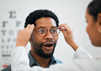 Image showing Consulting, wow and optometry with black man and glasses for medical, shopping and help. Healthcare, ophthalmology and eye care with patient and doctor for surprise, advice and lens prescription