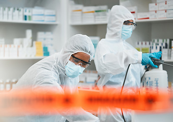 Image showing Pharmacy disinfection, red tape and people spray chemical solution for protection, cleaning hospital or contaminated clinic. Safety policy, hazmat PPE and healthcare team sanitize medical product