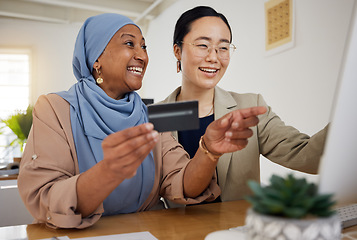 Image showing Online shopping, credit card and woman at customer service desk for banking and talking to a consultant. Muslim, asian and professional consulting a customer on rewards purchase on business website