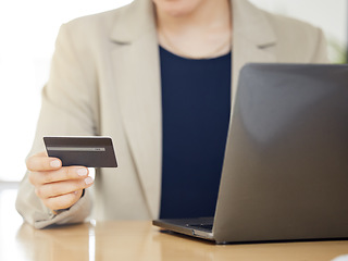 Image showing Online shopping, credit card and business woman with payment on a internet or banking on a laptop. Hands, loan and corporate professional or customer use rewards to purchase on ecommerce website