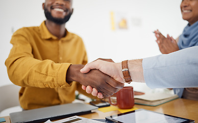 Image showing Creative people, handshake and meeting in celebration, promotion or partnership in teamwork at office. Happy employees shaking hands in team recruiting, agreement or deal in startup at the workplace