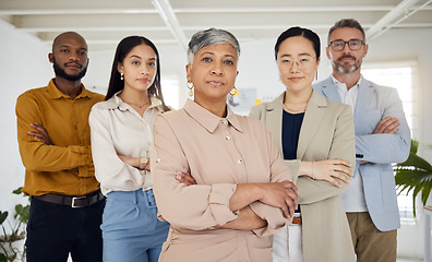 Image showing Business people, serious and arms crossed portrait in a office with diversity and senior woman ceo. Company, management team and confidence of professional leadership and creative agency group