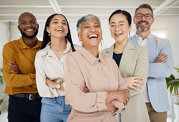 Image showing Business people, laughing and arms crossed portrait in a office with diversity and senior woman ceo. Company, management team and funny joke of professional leadership and creative agency group