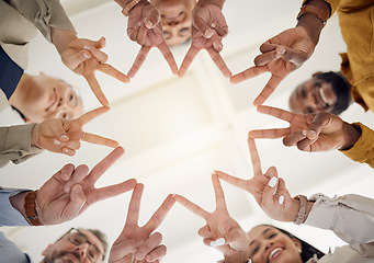 Image showing Peace, hands and business people in office for teamwork, collaboration and support low angle. V, star and happy team in solidarity, commitment or positive coworking agreement, trust or motivation