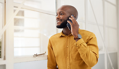 Image showing Business, happy black man and thinking with phone call communication in office for feedback on mobile. Employee talking on smartphone for contact, consulting and conversation to chat ideas at window