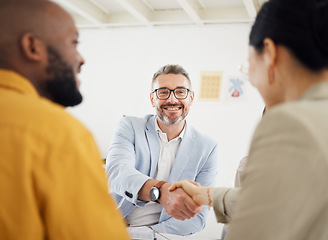 Image showing Happy business people, handshake and interview in meeting, hiring or corporate growth at the office. Group of employees shaking hands in teamwork, recruiting or b2b deal for partnership at workplace