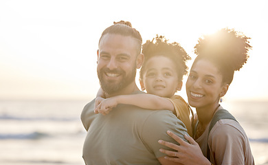 Image showing Portrait, family and happy at beach at sunset, bonding and having fun outdoor. Face, smile and father, kid and mother at ocean in interracial care, summer holiday and vacation to travel mockup space