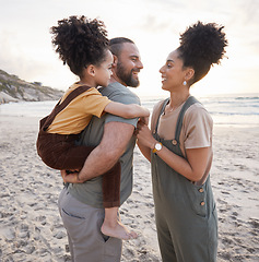 Image showing Piggyback, family and smile at beach at sunset, bonding and having fun together. Happy, mother and father of kid at ocean in interracial care on summer holiday, vacation trip or travel outdoor at sea