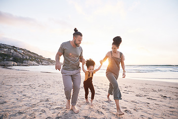 Image showing Family, holding hands and beach for travel, vacation and freedom, bond and fun in nature together. Love, swing and girl child with parents at the ocean playing, relax and walking on summer holiday