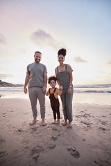 Image showing Portrait, sunset and family holding hands, beach and bonding with vacation, travel and ocean getaway. Happy parents, mother or father with girl, child or sand with seaside holiday, adventure and love